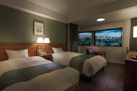 全室高層階なので、窓から都心の夜景を見渡せる。スタイリッシュな外観も特徴的