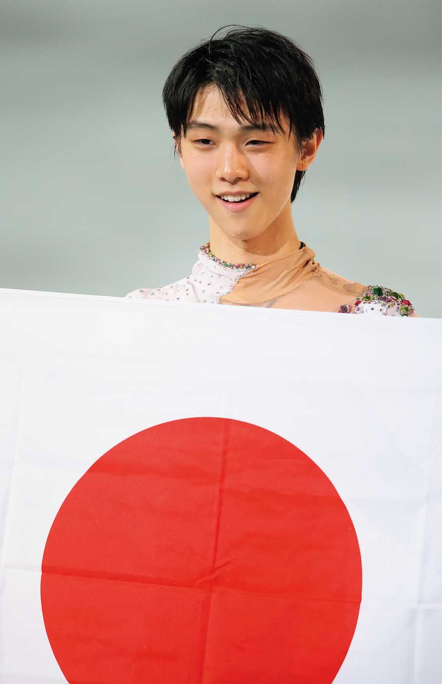 2014年ソチ・羽生結弦（フィギュアスケート）19歳で五輪初出場。世界選手権3連覇中のパトリック・チャンを破り、五輪のフィギュア男子シングルではアジア初の金メダル。「全力を尽くしましたが最高のパフォーマンスはできなかった。その点に関しては悔しい。4年後もあるが日々精進していきたい」と感想を。また、東日本大震災からの復興のためにできることがあるのでは、とも語っていた　写真/アフロ