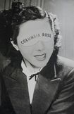 覆面をつけたコロムビア・ローズ。これは挨拶状に使う写真だったという