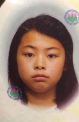 10歳のときのパスポート写真。「変わらない。眉毛も変わってない」