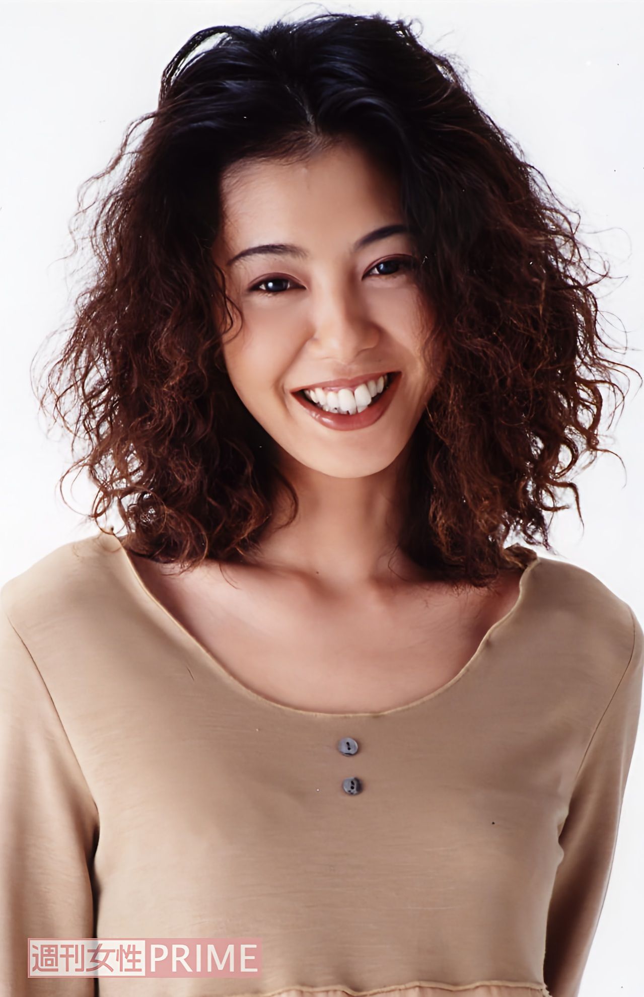 30歳はソバージュヘアがトレードマークだった