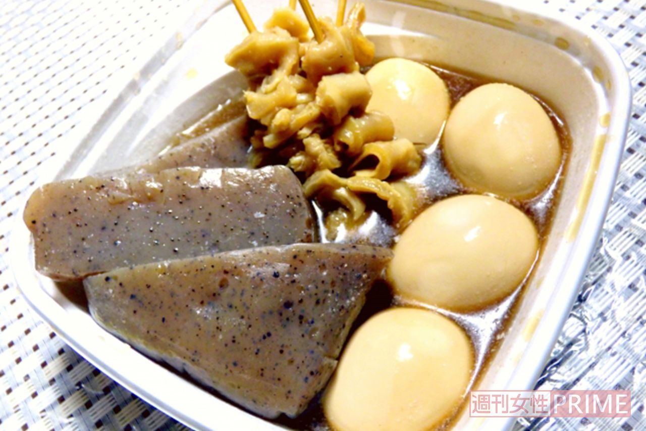 おでん（添加物で食感とカサ増しした練り製品、化学調味料で味つけした汁、環境ホルモンの溶け出すプラ容器。3種のリスクが湯気の向こうに。）