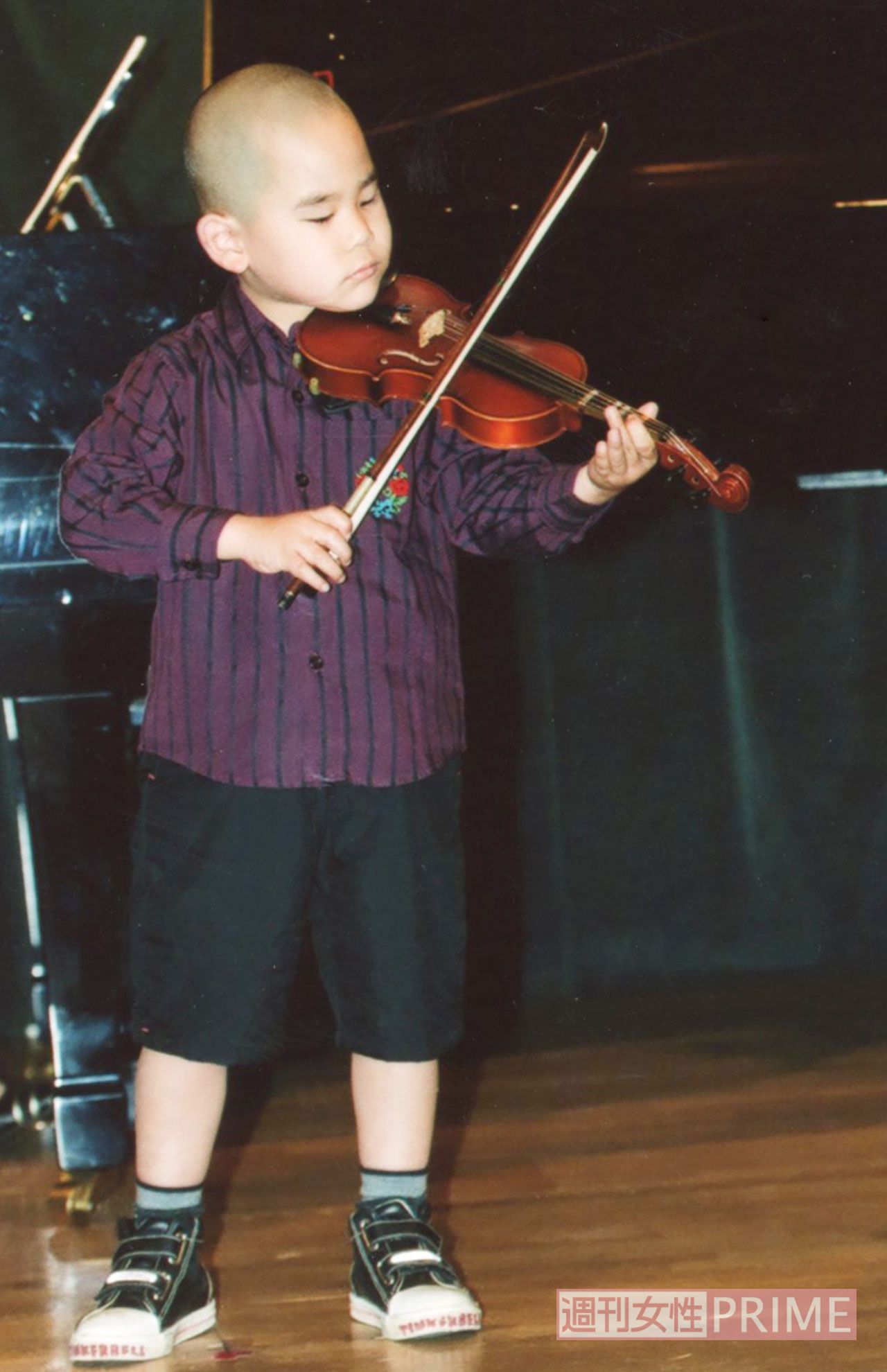 5歳のときには老人ホームでのボランティア演奏を始めていた（’01 年）