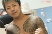 日渡容疑者の肩から腕、背中、大腿部には和彫りの刺青が彫られている