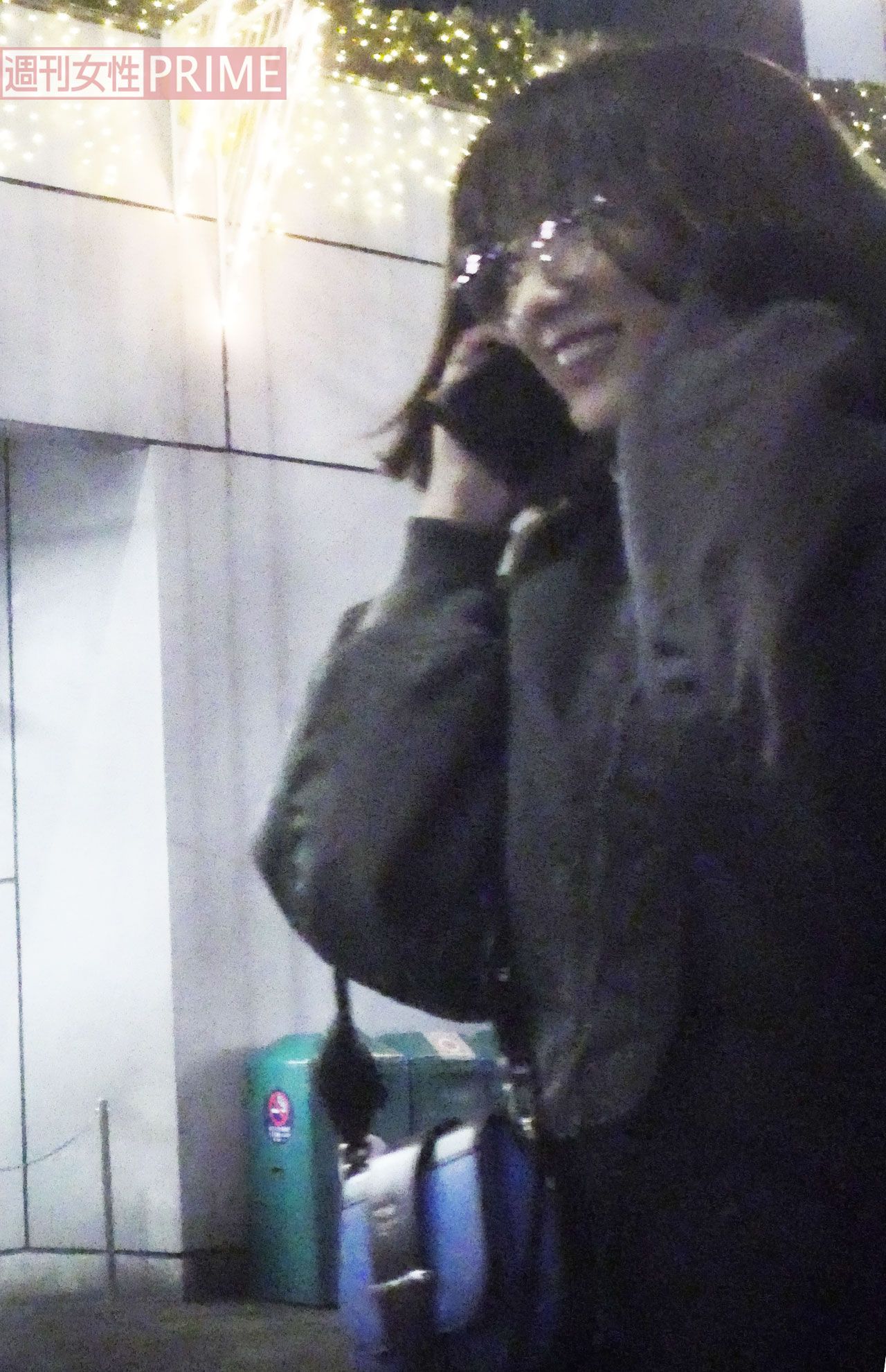 通話しながら会場へ向かう永野は半分、笑顔