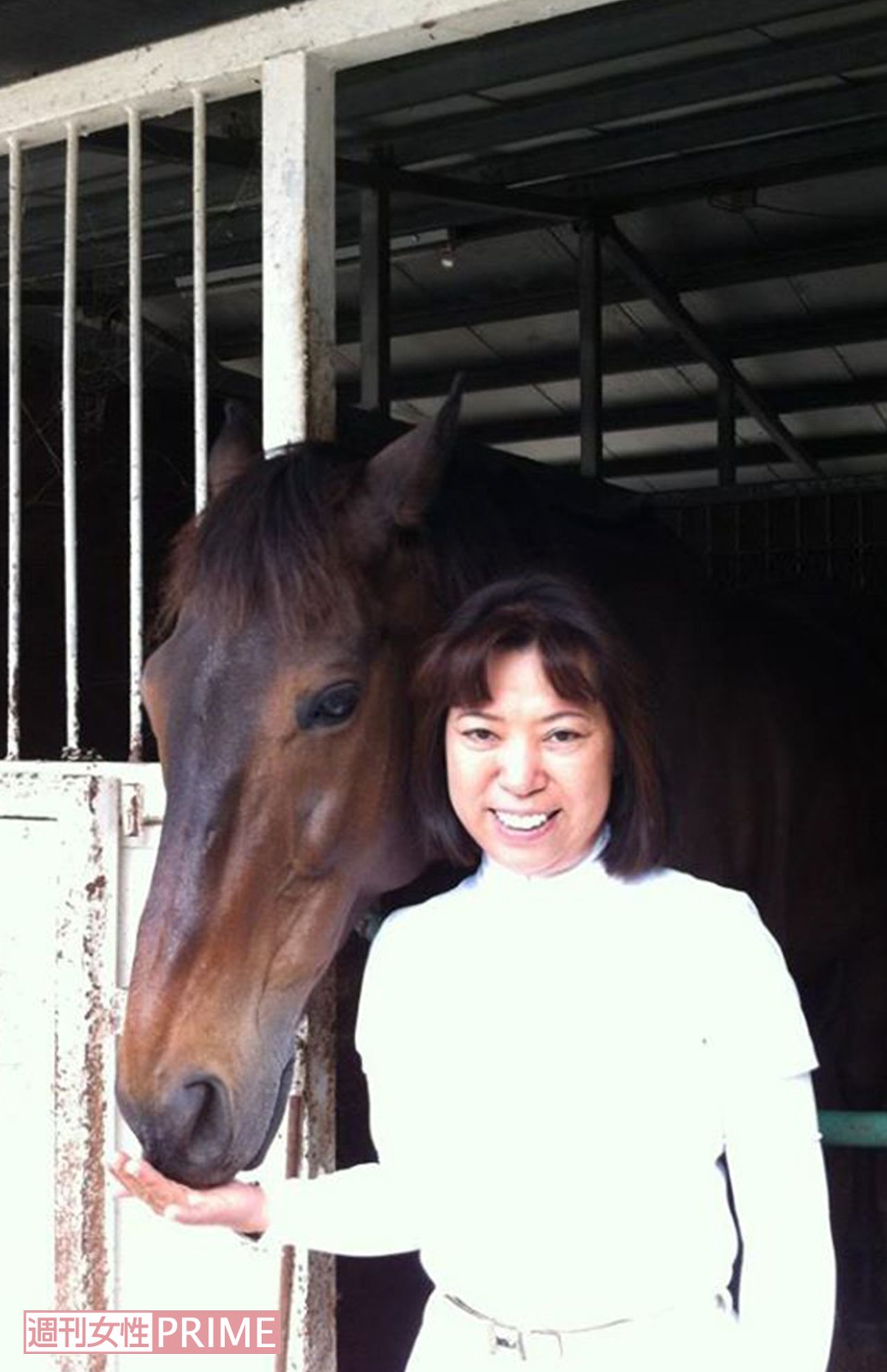 愛馬と写る田村容疑者（田村容疑者のFacebookより）
