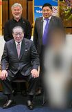前列の田中英寿容疑者から時計回りに医療法人前理事長の籔本雅巳被告、元理事の井ノ口忠男被告(日大HPより)
