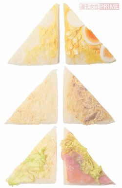 コンビニのサンドイッチ。ツナ・たまごの具材は購入の際に消費者の目に入る断面にのみ偏って置かれている