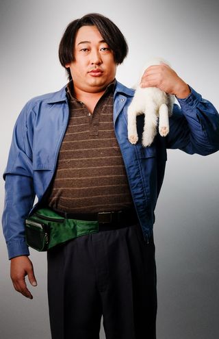 容疑者9：村田安夫。猫を飼う男。カートにたくさんの猫を入れて街を徘徊している謎多き人物。(c)テレビ東京